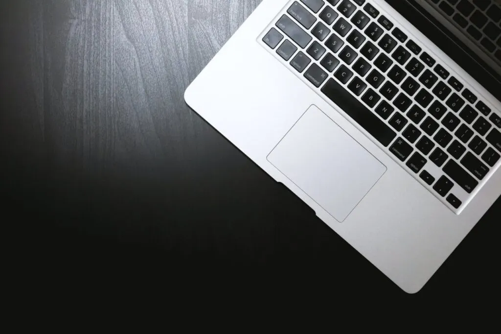 a computer on a black desk