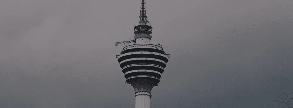 a tower and gray sky