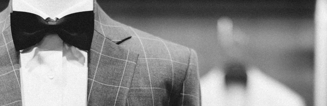 A suit manufactured by luxury retail brands